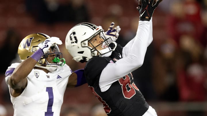 Oct 28, 2023; Stanford, California, USA; Stanford Cardinal wide receiver Jackson Harris (83) hauls in a 43-yard pass in front of Washington Huskies cornerback Jabbar Muhammad (1) during the fourth quarter at Stanford Stadium. Mandatory Credit: D. Ross Cameron-Imagn Images Oct 28, 2023; Stanford, California, USA; Stanford Cardinal wide receiver Jackson Harris (83) hauls in a 43-yard pass in front of Washington Huskies cornerback Jabbar Muhammad (1) during the fourth quarter at Stanford Stadium. Mandatory Credit: D. Ross Cameron-Imagn Images
