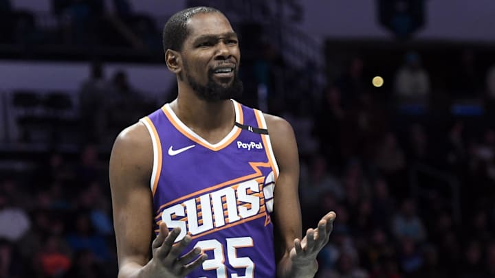 Jan 7, 2025; Charlotte, North Carolina, USA;  Phoenix Suns forward Kevin Durant (35) reacts to a foul call during the first half against the Charlotte Hornets at the Spectrum Center. Mandatory Credit: Sam Sharpe-Imagn Images