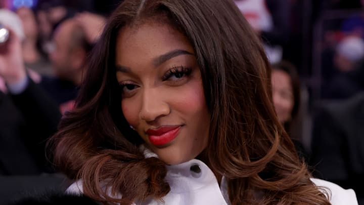 Dec 3, 2024; New York, New York, USA; Chicago Sky forward Angel Reese sits court side during the fourth quarter between the New York Knicks and the Orlando Magic at Madison Square Garden. 