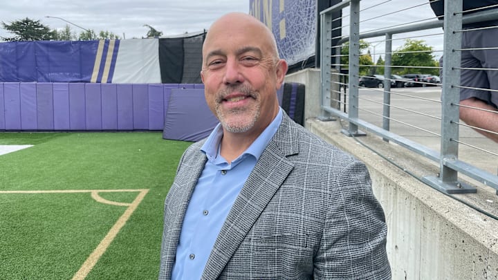 Jim Nevelle, former UW center, was a practice visitor. Jim Nevelle, former UW center, was a practice visitor.