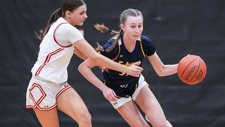 Whitnall's Riley Ward (right) drives past Pewaukee's Kendall Pieper (left) during a Woodland Conference game on Wednesday, Feb. 19, 2025. Whitnall's Riley Ward (right) drives past Pewaukee's Kendall Pieper (left) during a Woodland Conference game on Wednesday, Feb. 19, 2025.