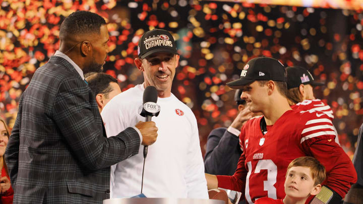 Jan 28, 2024; Santa Clara, California, USA; Fox Sports broadcaster and former NFL player Michael Strahan interviews San Francisco 49ers head coach Kyle Shanahan after winning the NFC Championship football game against the Detroit Lions at Levi's Stadium. Mandatory Credit: Kelley L Cox-USA TODAY Sports