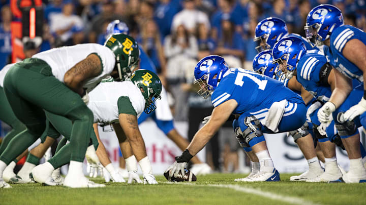 Sep 10, 2022; Provo, Utah, USA; Brigham Young Cougars offensive lineman Blake Freeland (71) prepares to snap the ball in the second half against the Baylor Bears  at LaVell Edwards Stadium. Mandatory Credit: Gabriel Mayberry-Imagn Images