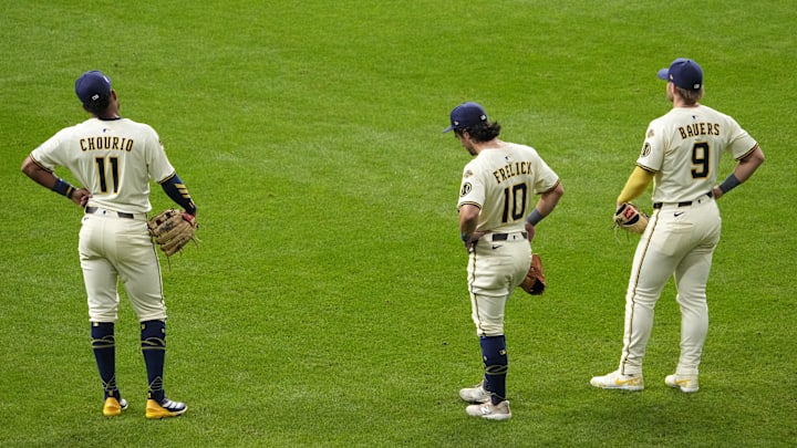Oct 14, 2025; Milwaukee, Wisconsin, USA; Milwaukee Brewers center fielder Jackson Chourio (11), right fielder Sal Frelick (10) and first baseman Jake Bauers (9) stand in the outfield during a pitching change against the Los Angeles Dodgers in the eighth inning during game two of the NLCS round for the 2025 MLB playoffs at American Family Field. Mandatory Credit: Michael McLoone-Imagn Images Oct 14, 2025; Milwaukee, Wisconsin, USA; Milwaukee Brewers center fielder Jackson Chourio (11), right fielder Sal Frelick (10) and first baseman Jake Bauers (9) stand in the outfield during a pitching change against the Los Angeles Dodgers in the eighth inning during game two of the NLCS round for the 2025 MLB playoffs at American Family Field. Mandatory Credit: Michael McLoone-Imagn Images