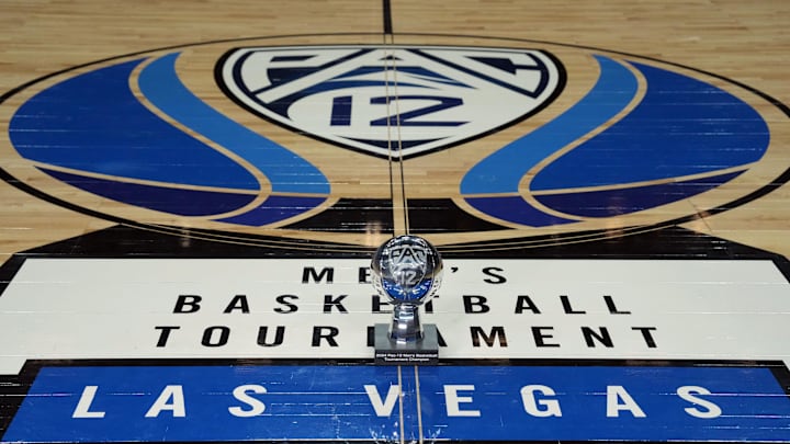 Mar 16, 2024; Las Vegas, NV, USA; The 2024 Pac-12 Conference men's basketball champion trophy at center court on the Pac-12 logo at T-Mobile Arena. Mandatory Credit: Kirby Lee-Imagn Images Mar 16, 2024; Las Vegas, NV, USA; The 2024 Pac-12 Conference men's basketball champion trophy at center court on the Pac-12 logo at T-Mobile Arena. Mandatory Credit: Kirby Lee-Imagn Images