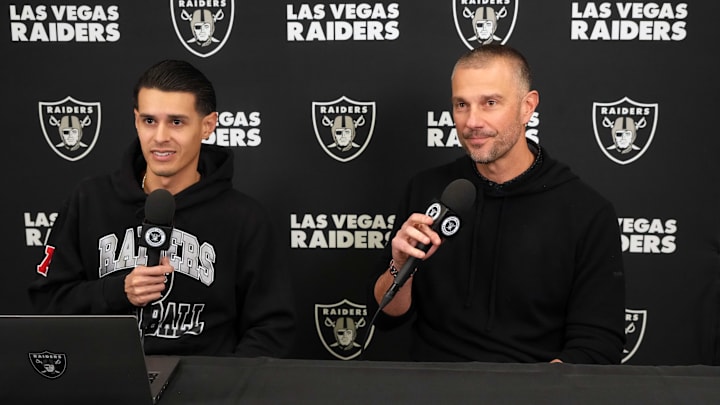 Feb 25, 2025; Indianapolis, IN, USA; Las Vegas Raiders general manager John Spytek (right) is interviewed by Raiders.com senior writer Eddie Paskal on radio row during the NFL Scouting Combine at the Indiana Convention Center. Mandatory Credit: Kirby Lee-Imagn Images
