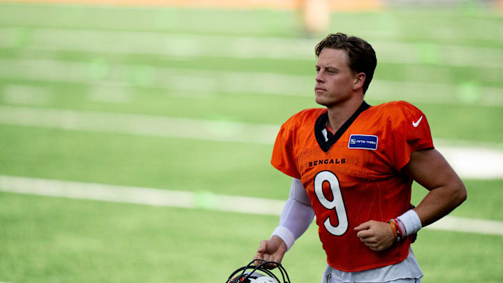 Cincinnati Bengals quarterback Joe Burrow (9) runs onto the field during Bengals Camp practice at Paycor Stadium in Cincinnati on Aug. 2, 2025.