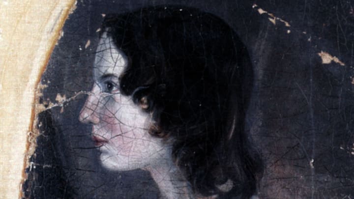 Cracked portrait of a dark-haired Emily Bronte