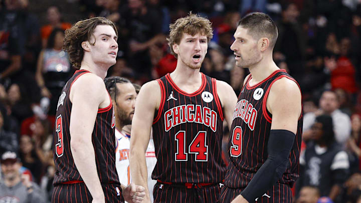 Oct 31, 2025; Chicago, Illinois, USA; Chicago Bulls guard Josh Giddey (3), forward Matas Buzelis (14) and center Nikola Vucevic (9) celebrate during the second half of an NBA game against the New York Knicks at United Center. Mandatory Credit: Kamil Krzaczynski-Imagn Images Oct 31, 2025; Chicago, Illinois, USA; Chicago Bulls guard Josh Giddey (3), forward Matas Buzelis (14) and center Nikola Vucevic (9) celebrate during the second half of an NBA game against the New York Knicks at United Center. Mandatory Credit: Kamil Krzaczynski-Imagn Images