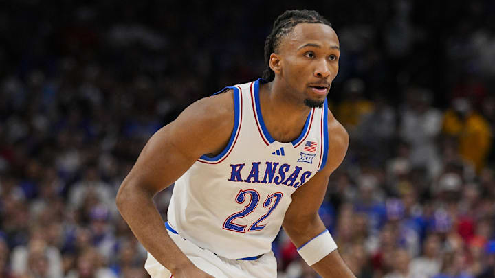 Dec 7, 2025; Kansas City, Missouri, USA; Kansas Jayhawks guard Darryn Peterson (22) dribbles the ball during the first half against the Missouri Tigers at T-Mobile Center. Mandatory Credit: Jay Biggerstaff-Imagn Images