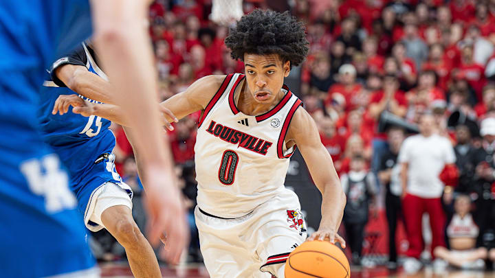 Louisville Cardinals guard Mikel Brown Jr. (0) drove to the basket during the second half as the Louisville Cardinals hosted the Kentucky Wildcats at the KFC Yum! Center on Tuesday, Nov. 11, 2025. The Cardinals defeated the Wildcats 96-88. Louisville Cardinals guard Mikel Brown Jr. (0) drove to the basket during the second half as the Louisville Cardinals hosted the Kentucky Wildcats at the KFC Yum! Center on Tuesday, Nov. 11, 2025. The Cardinals defeated the Wildcats 96-88.