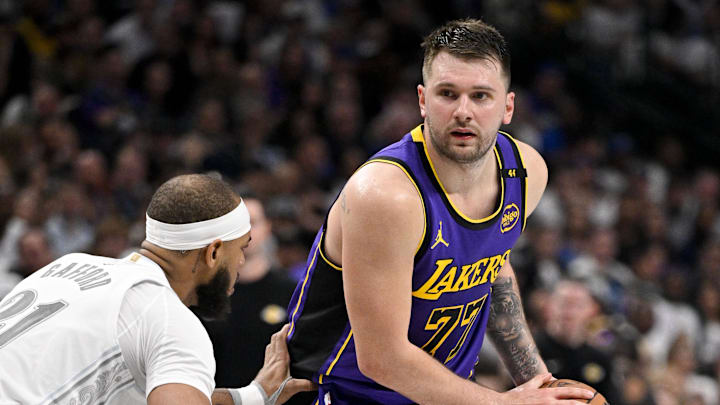 Apr 9, 2025; Dallas, Texas, USA; Dallas Mavericks center Daniel Gafford (21) and Los Angeles Lakers guard Luka Doncic (77) in action during the game between the Dallas Mavericks and the Los Angeles Lakers at American Airlines Center. Mandatory Credit: Jerome Miron-Imagn Images Apr 9, 2025; Dallas, Texas, USA; Dallas Mavericks center Daniel Gafford (21) and Los Angeles Lakers guard Luka Doncic (77) in action during the game between the Dallas Mavericks and the Los Angeles Lakers at American Airlines Center. Mandatory Credit: Jerome Miron-Imagn Images