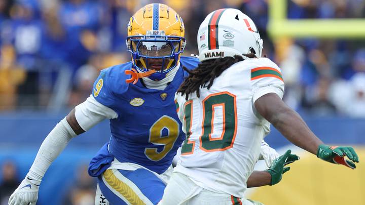 Nov 29, 2025; Pittsburgh, Pennsylvania, USA; Pittsburgh Panthers linebacker Kyle Louis (9) in pass coverage against Miami Hurricanes wide receiver Malachi Toney (10) during the third quarter at Acrisure Stadium. Mandatory Credit: Charles LeClaire-Imagn Images Nov 29, 2025; Pittsburgh, Pennsylvania, USA; Pittsburgh Panthers linebacker Kyle Louis (9) in pass coverage against Miami Hurricanes wide receiver Malachi Toney (10) during the third quarter at Acrisure Stadium. Mandatory Credit: Charles LeClaire-Imagn Images