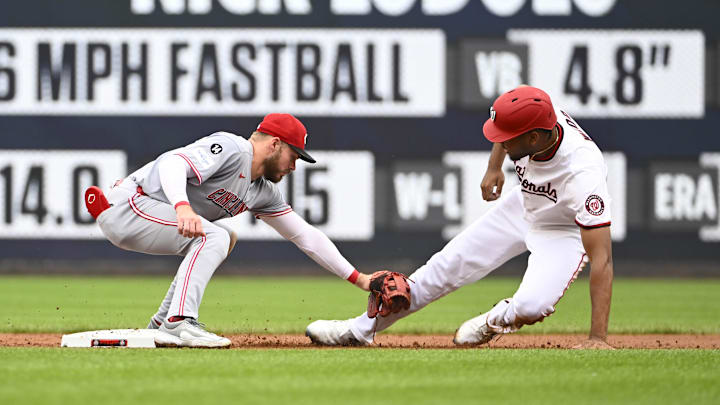 Jul 23, 2025; Washington, District of Columbia, USA; Washington Nationals left fielder James Wood (29) is tagged out at second base by Cincinnati Reds second baseman Gavin Lux (2) at Nationals Park. Jul 23, 2025; Washington, District of Columbia, USA; Washington Nationals left fielder James Wood (29) is tagged out at second base by Cincinnati Reds second baseman Gavin Lux (2) at Nationals Park.