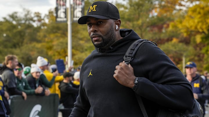 Oct 25, 2025; East Lansing, Michigan, USA; University of Michigan head coach Sherrone Moore walks into Spartan Stadium before a game against the Michigan State Spartans. Oct 25, 2025; East Lansing, Michigan, USA; University of Michigan head coach Sherrone Moore walks into Spartan Stadium before a game against the Michigan State Spartans.