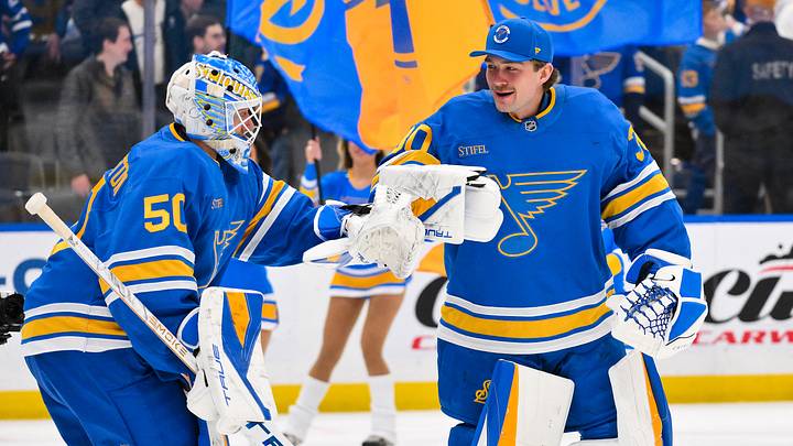 Mar 28, 2026; St. Louis, Missouri, USA; St. Louis Blues goaltender Jordan Binnington (50) is congratulated by goaltender Joel Hofer (30) after the Blues defeated the Toronto Maple Leafs at Enterprise Center. Mandatory Credit: Jeff Curry-Imagn Images