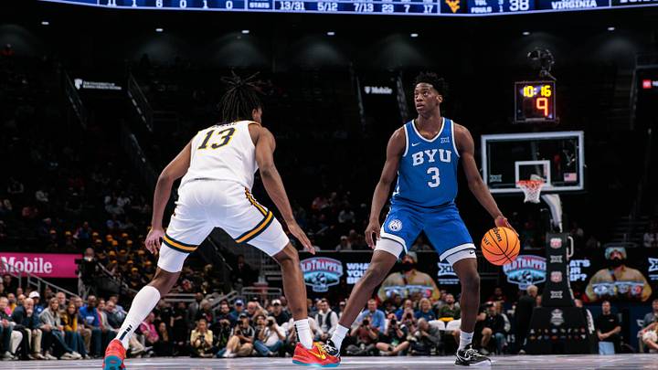 Mar 11, 2026; Kansas City, MO, USA; BYU Cougars forward AJ Dybantsa (3) brings the ball up court around West Virginia Mountaineers guard Chance Moore (13) during the second half at T-Mobile Center. Mandatory Credit: William Purnell-Imagn Images Mar 11, 2026; Kansas City, MO, USA; BYU Cougars forward AJ Dybantsa (3) brings the ball up court around West Virginia Mountaineers guard Chance Moore (13) during the second half at T-Mobile Center. Mandatory Credit: William Purnell-Imagn Images