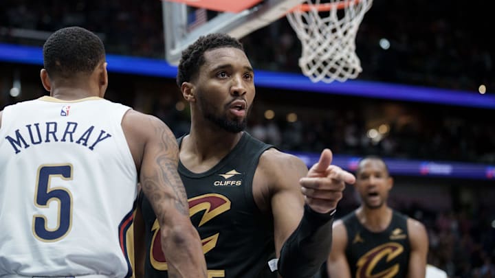Mar 21, 2026; New Orleans, Louisiana, USA; Cleveland Cavaliers guard Donovan Mitchell (45) points to the referee for a and one foul shot after making a basket against New Orleans Pelicans guard Dejounte Murray (5) during the second half at Smoothie King Center. Mandatory Credit: Matthew Hinton-Imagn Images Mar 21, 2026; New Orleans, Louisiana, USA; Cleveland Cavaliers guard Donovan Mitchell (45) points to the referee for a and one foul shot after making a basket against New Orleans Pelicans guard Dejounte Murray (5) during the second half at Smoothie King Center. Mandatory Credit: Matthew Hinton-Imagn Images