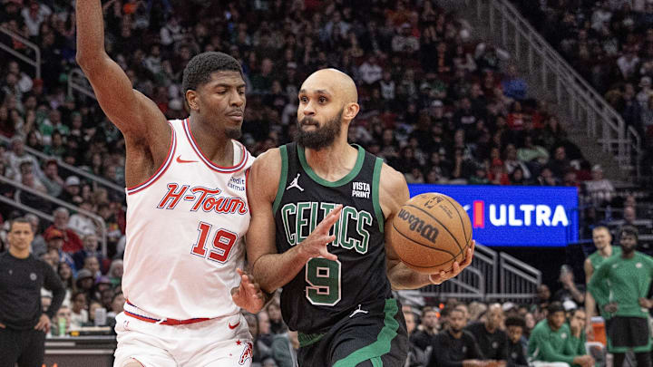 Jan 21, 2024; Houston, Texas, USA; Boston Celtics guard Derrick White (9) dribbles against Houston Rockets guard Nate Williams (19) in the second half at Toyota Center. Mandatory Credit: Thomas Shea-Imagn Images Jan 21, 2024; Houston, Texas, USA; Boston Celtics guard Derrick White (9) dribbles against Houston Rockets guard Nate Williams (19) in the second half at Toyota Center. Mandatory Credit: Thomas Shea-Imagn Images