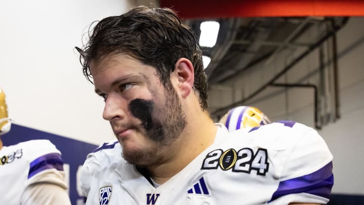 Jan 8, 2024; Houston, TX, USA; Washington Huskies offensive lineman Roger Rosengarten (73) against Jan 8, 2024; Houston, TX, USA; Washington Huskies offensive lineman Roger Rosengarten (73) against