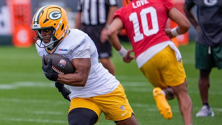 Green Bay Packers running back MarShawn Lloyd (32) runs through a drill during practice on Friday, July 31, 2026, at Ray Nitschke Field in Ashwaubenon, Wisconsin. Green Bay Packers running back MarShawn Lloyd (32) runs through a drill during practice on Friday, July 31, 2026, at Ray Nitschke Field in Ashwaubenon, Wisconsin.