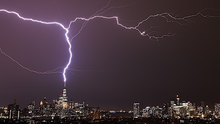 Lightning strikes over the Freedom Tower (a.k.a. One World Trade Center) in New York City.