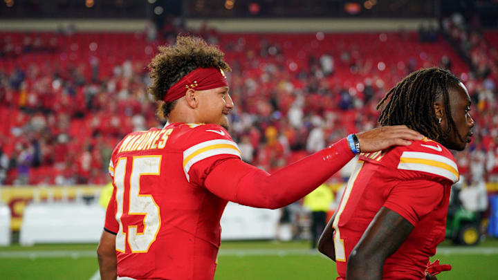 Sep 5, 2024; Kansas City, Missouri, USA; Kansas City Chiefs quarterback Patrick Mahomes (15) celebrates with wide receiver Xavier Worthy (1) after the win over the Baltimore Ravens at GEHA Field at Arrowhead Stadium. Mandatory Credit: Denny Medley-Imagn Images