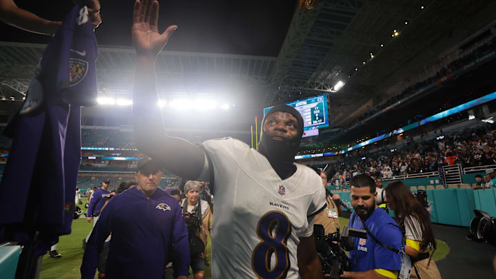 Oct 30, 2025; Miami Gardens, Florida, USA; Baltimore Ravens quarterback Lamar Jackson (8) walks off the field after a win over Miami Dolphins at Hard Rock Stadium. Mandatory Credit: Sam Navarro-Imagn Images