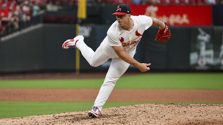 Jul 13, 2025; St. Louis, Missouri, USA;  St. Louis Cardinals relief pitcher Ryan Helsley (56) pitches against the Atlanta Braves during the ninth inning at Busch Stadium. Mandatory Credit: Jeff Curry-Imagn Images