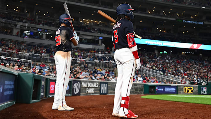 May 6, 2025; Washington, District of Columbia, USA;  Washington Nationals designated hitter James Wood (29) and shortstop CJ Abrams (5) wait for a pitching change during the sixth inning against the Cleveland Guardians at Nationals Park.