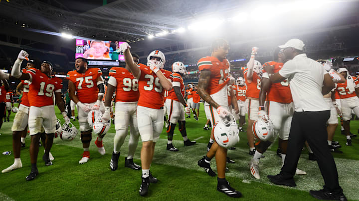 Sep 27, 2024; Miami Gardens, Florida, USA; Miami Hurricanes linebacker Casey Rizzi (39) celebrates with teammates after the game against the Virginia Tech Hokies at Hard Rock Stadium. Mandatory Credit: Sam Navarro-Imagn Images
