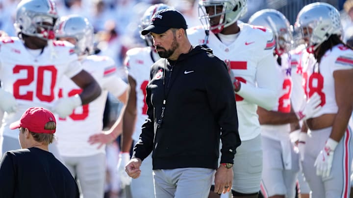 Ohio State Buckeyes head coach Ryan Day leads warm ups prior to the NCAA football game against the Penn State Nittany Lions at Beaver Stadium in University Park, Pa. on Saturday, Nov. 2, 2024.