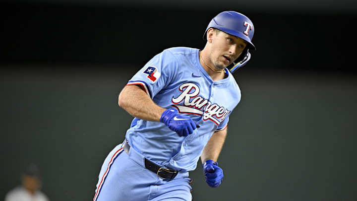 Sep 21, 2025; Arlington, Texas, USA; Texas Rangers left fielder Wyatt Langford (36) rounds the bases after he hits a home run against the Miami Marlins during the sixth inning at Globe Life Field. Mandatory Credit: Jerome Miron-Imagn Images