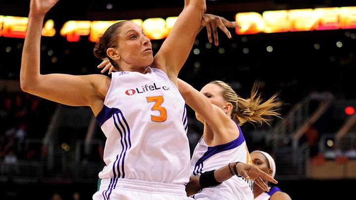 Sep 17 2011; Phoenix, AZ, USA; Phoenix Mercury guard Diana Taurasi (3) and teammate forward Penny Taylor (13) jump for the ball while playing against the Seattle Storm during the second half at the US Airways Center.  The Mercury defeated the Storm 92 - 83. Mandatory Credit: Jennifer Stewart-Imagn Images