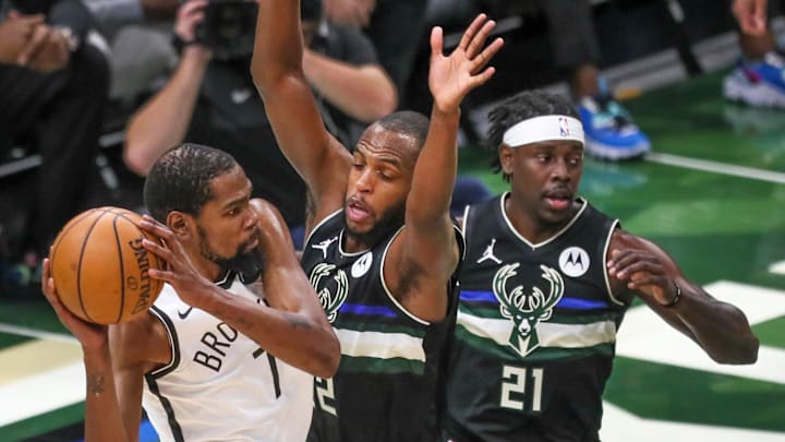 Nets forward Kevin Durant can't find any room to operate against the Bucks' Khris Middleton and Jrue Holiday Nets forward Kevin Durant can't find any room to operate against the Bucks' Khris Middleton and Jrue Holiday