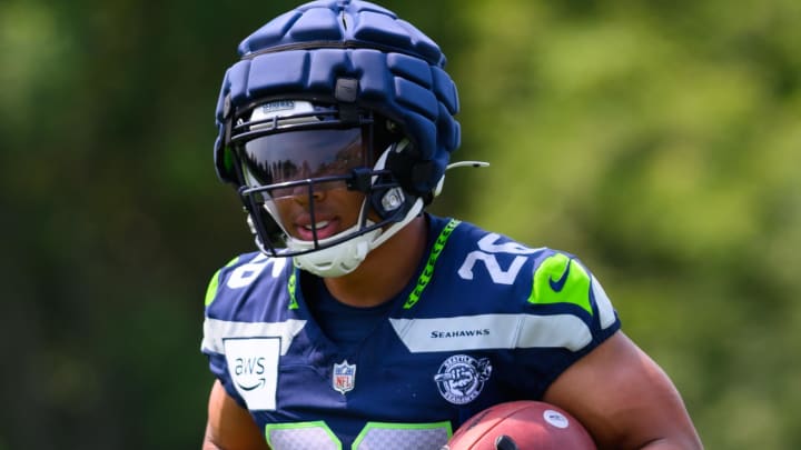 Jul 27, 2024; Renton, WA, USA; Seattle Seahawks running back Zach Charbonnet (26) during training camp at Virginia Mason Athletic Center. Jul 27, 2024; Renton, WA, USA; Seattle Seahawks running back Zach Charbonnet (26) during training camp at Virginia Mason Athletic Center.