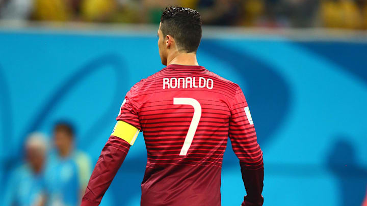 Jun 22, 2014; Manaus, Amazonas, BRAZIL; Portugal forward Cristiano Ronaldo (7) against USA during the 2014 World Cup at Arena Amazonia. The game ended in a 2-2 draw.  Mandatory Credit: Mark J. Rebilas-Imagn Images