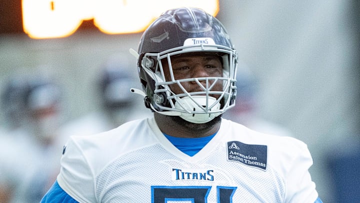Defensive lineman Keondre Coburn (91) runs through drills during the Tennessee Titans mandatory mini-camp at Ascension Saint Thomas Sports Park in Nashville, Tenn., Tuesday, June 4, 2024.