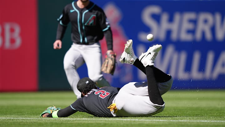 Apr 11, 2026; Philadelphia, Pennsylvania, USA; Arizona Diamondbacks infielder Geraldo Perdomo (2) dives and allows a double against the Philadelphia Phillies in the sixth inning at Citizens Bank Park. Mandatory Credit: Kyle Ross-Imagn Images