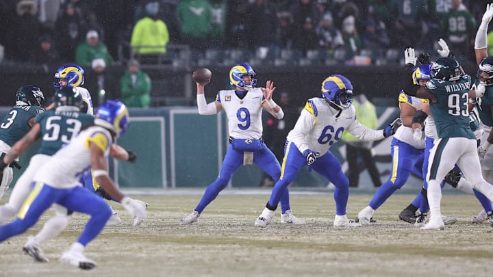 Jan 19, 2025; Philadelphia, Pennsylvania, USA; Los Angeles Rams quarterback Matthew Stafford (9) throws the ball in the second half against the Philadelphia Eagles in a 2025 NFC divisional round game at Lincoln Financial Field. Mandatory Credit: Bill Streicher-Imagn Images