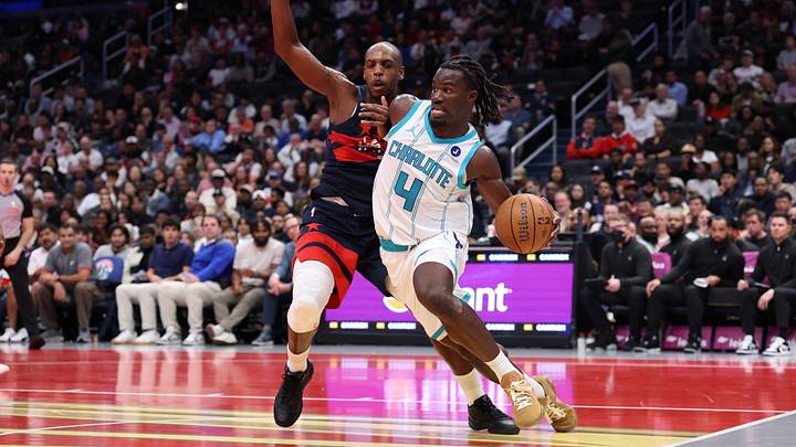 Oct 30, 2026; Washington, District of Columbia, USA; Charlotte Hornets guard Sion James (4) drives to the basket as Washington Wizards forward Khris Middleton (22) defends in the first half in an NBA Cup game at Capital One Arena. Mandatory Credit: Geoff Burke-Imagn Images Oct 30, 2026; Washington, District of Columbia, USA; Charlotte Hornets guard Sion James (4) drives to the basket as Washington Wizards forward Khris Middleton (22) defends in the first half in an NBA Cup game at Capital One Arena. Mandatory Credit: Geoff Burke-Imagn Images