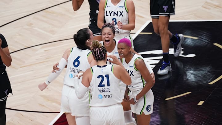 Minnesota Lynx forward Napheesa Collier (24), forward Bridget Carleton (6), guard Courtney Williams (10), guard Kayla McBride (21) and forward Alanna Smith (8) celebrate after defeating the Golden State Valkyries in game two of round one for the 2025 WNBA Playoffs at SAP Center. 