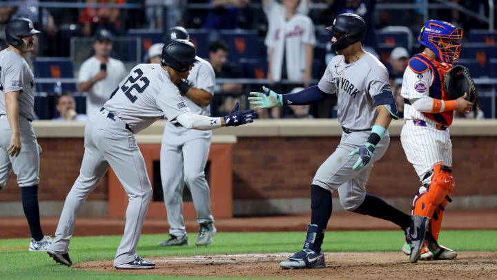 Jun 25, 2024; New York City, New York, USA; New York Yankees center fielder Aaron Judge (99) celebrates his grand slam home run against the New York Mets with right fielder Juan Soto (22) during the eighth inning at Citi Field. Mandatory Credit: Brad Penner-USA TODAY Sports