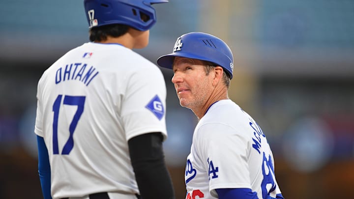 May 22, 2024; Los Angeles, California, USA; Los Angeles Dodgers first base coach Clayton McCullough (86) speaks with designated hitter Shohei Ohtani (17) during the first inning at Dodger Stadium. May 22, 2024; Los Angeles, California, USA; Los Angeles Dodgers first base coach Clayton McCullough (86) speaks with designated hitter Shohei Ohtani (17) during the first inning at Dodger Stadium.