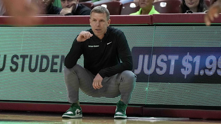 Nov 17, 2023; Charleston, SC, USA; North Texas Mean Green head coach Ross Hodge on the side line in the first half against the LSU Tigers at TD Arena. Mandatory Credit: David Yeazell-Imagn Images