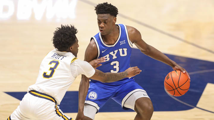 Feb 28, 2026; Morgantown, West Virginia, USA; BYU Cougars forward AJ Dybantsa (3) dribbles against West Virginia Mountaineers guard Honor Huff (3) during the second half at Hope Coliseum. Mandatory Credit: Ben Queen-Imagn Images
