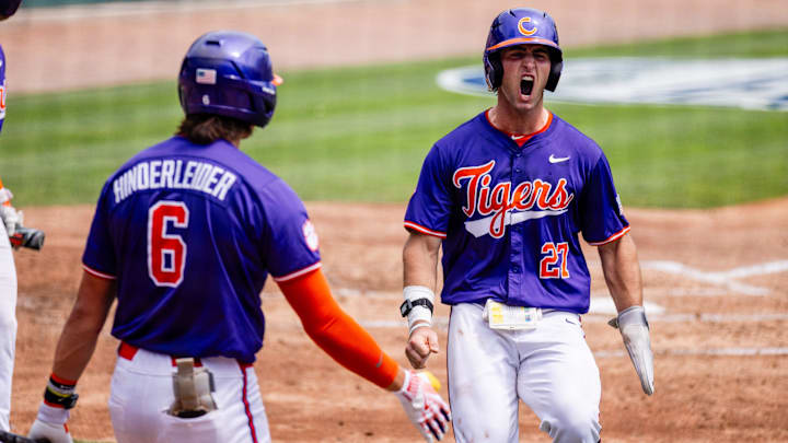 May 23, 2024; Charlotte, NC, USA; Clemson Tigers outfielder Tristan Bissetta (27) celebrates after scoring against the Miami (FL) Hurricanes in the second inning during the ACC Baseball Tournament at Truist Field. 