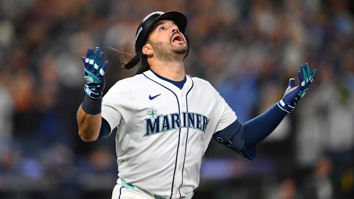 Seattle Mariners third baseman Eugenio Suarez (28) reacts