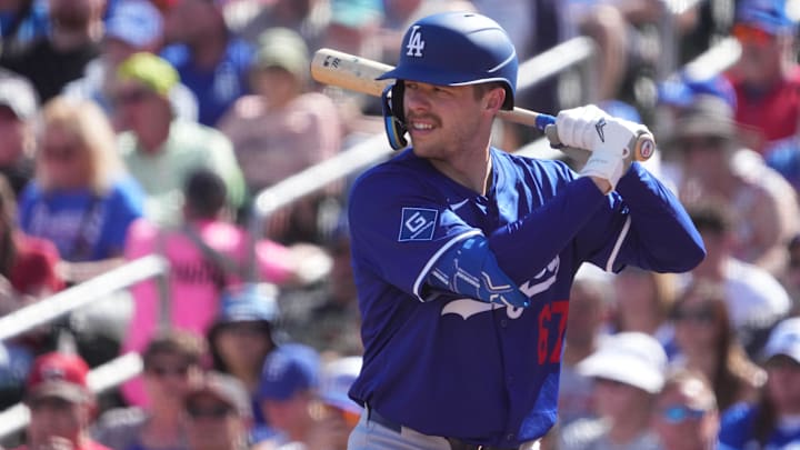 Feb 24, 2025; Goodyear, Arizona, USA; Los Angeles Dodgers catcher Hunter Feduccia (67) bats against the Cincinnati Reds during the second inning at Goodyear Ballpark. Mandatory Credit: Joe Camporeale-Imagn Images