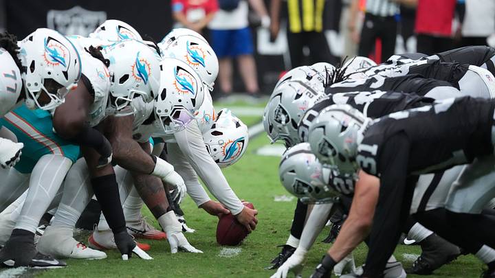 Sep 13, 2026; Paradise, Nevada, USA; Miami Dolphins offensive line and Las Vegas Raiders defensive line prepare for the snap in the second quarter at Allegiant Stadium. Mandatory Credit: Kirby Lee-Imagn Images Sep 13, 2026; Paradise, Nevada, USA; Miami Dolphins offensive line and Las Vegas Raiders defensive line prepare for the snap in the second quarter at Allegiant Stadium. Mandatory Credit: Kirby Lee-Imagn Images